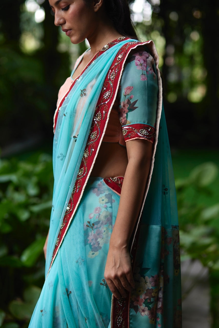 Mayura Kumar floral saree in aqua, peach and red, pallu detail