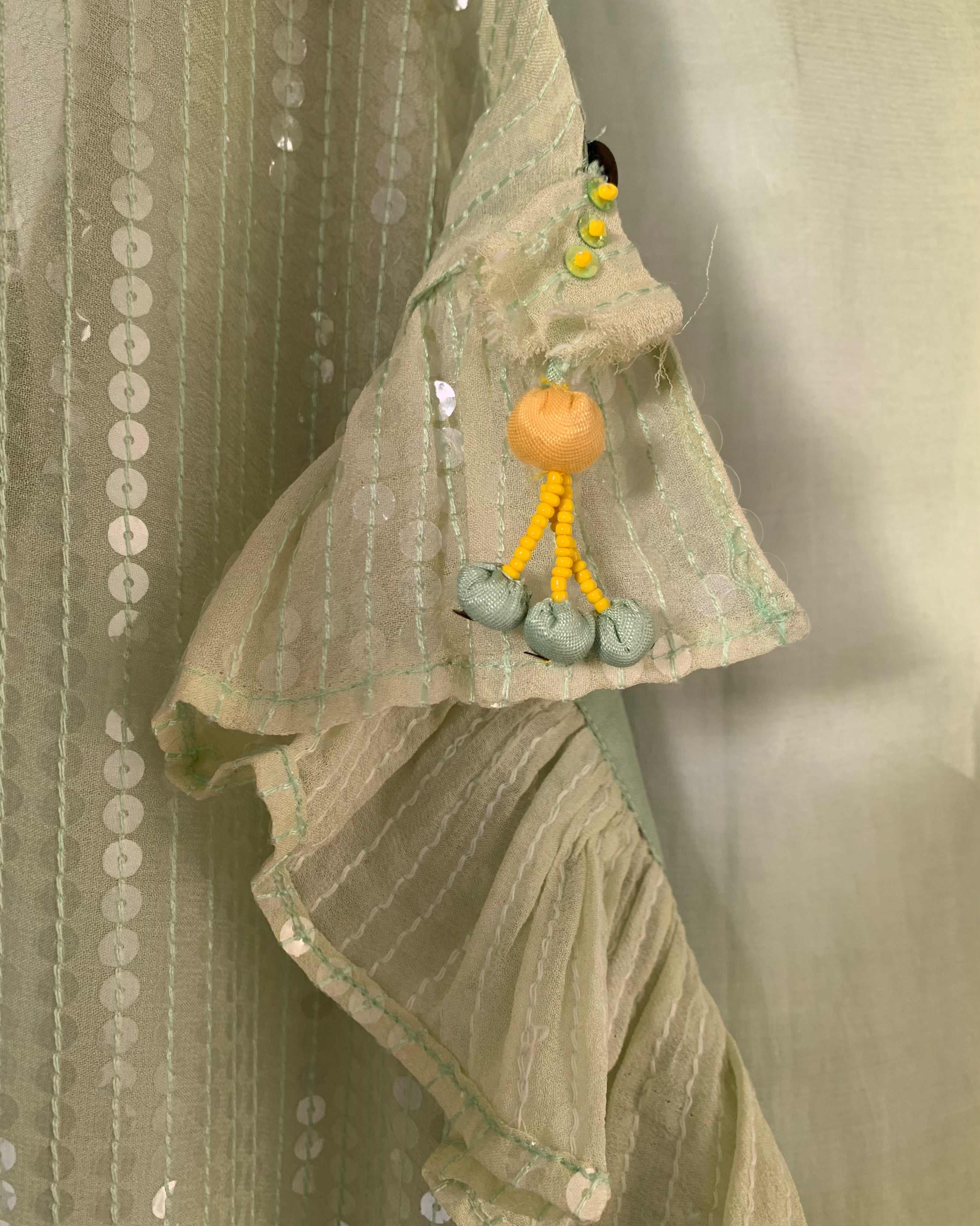 Mayura Kumar floral kurta set in green and lemon, detail shot