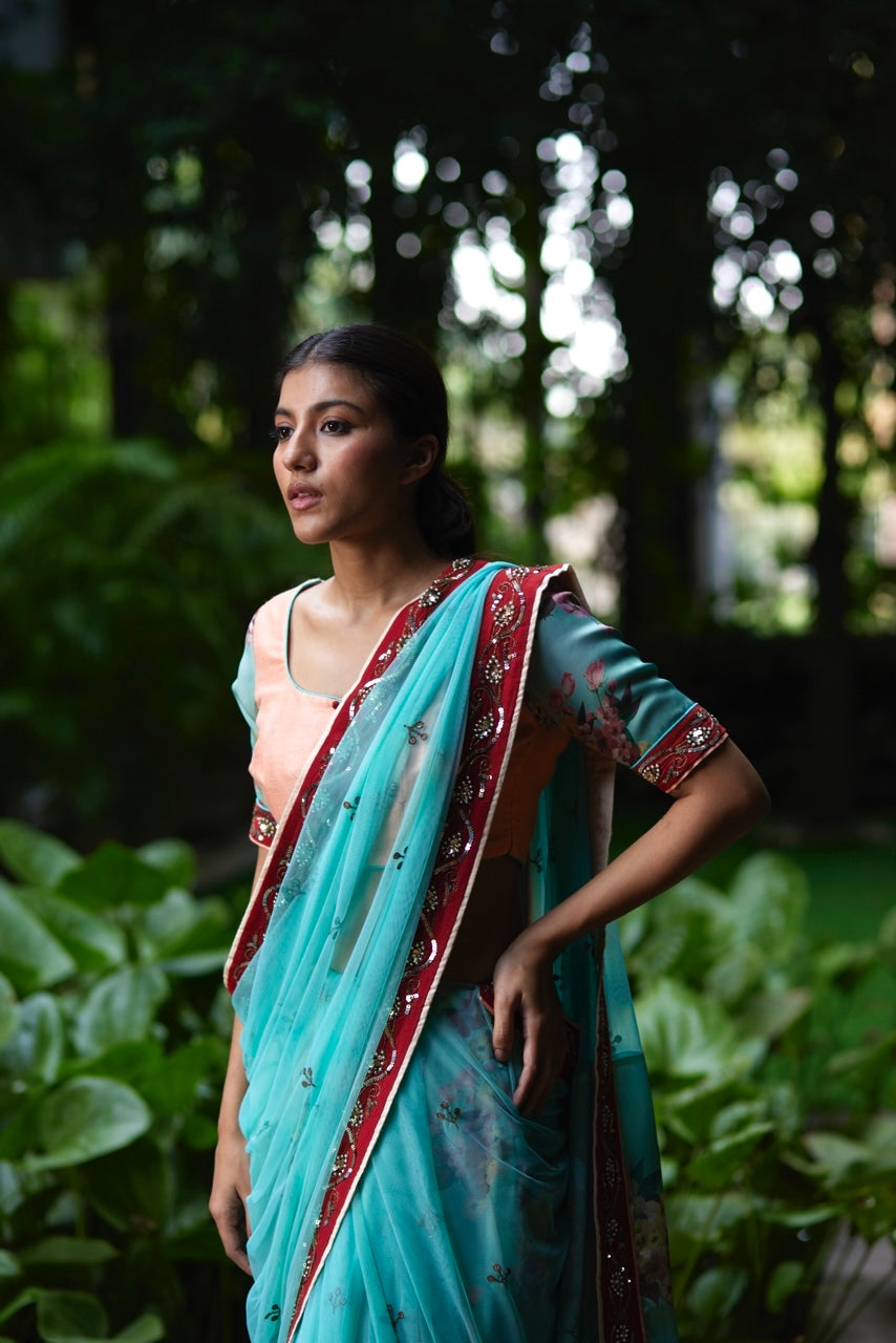 Mayura Kumar floral saree in aqua, peach and red, front view